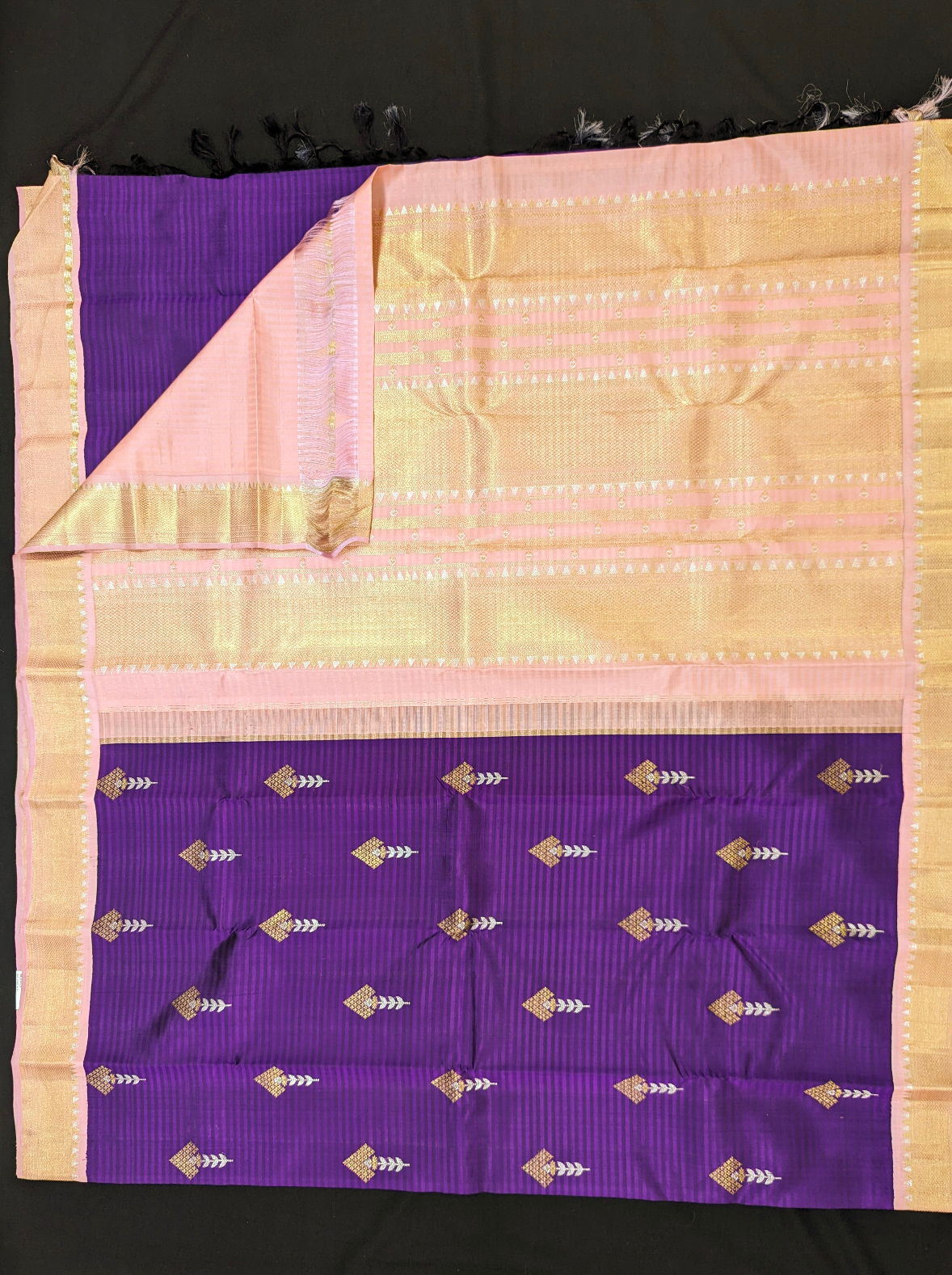 Exquisite Violet Korvai Silk Sari with intricate gold zari weaving.